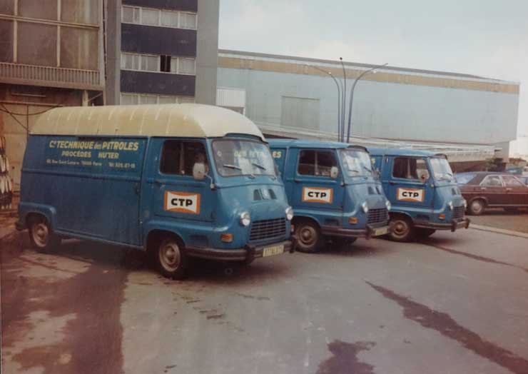 Vintage CTP service trucks parked outside facility in 1975, representing early field operations and industrial cleaning services