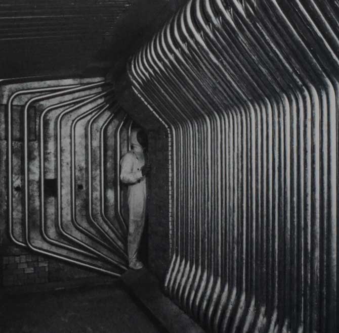 Interior view of industrial boiler water tubes during HUTER® chemical cleaning process